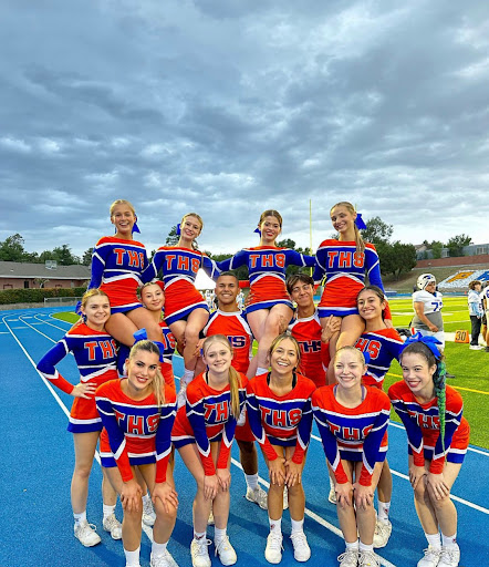 Cheerleaders Perform at the First Away Football Game