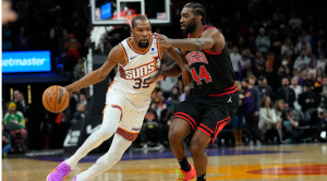 Phoenix Suns forward Kevin Durant (35) drives as Chicago Bulls forward Patrick Williams (44). Monday, Jan. 22, 2024, in Phoenix. 