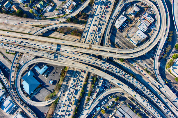 The heavy traffic on the interchange between the Interstate 10 and 110 freeways near downtown Los Angeles, California during rush hour.