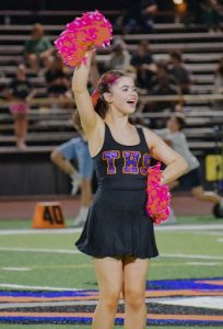 Sophomore Varsity Cheerleader at Thunderbird High School.