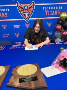 Hayven Lick signs her commitment to Park University