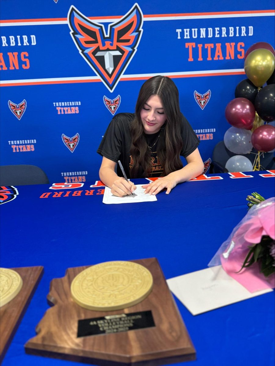 Hayven Lick signs her commitment to Park University